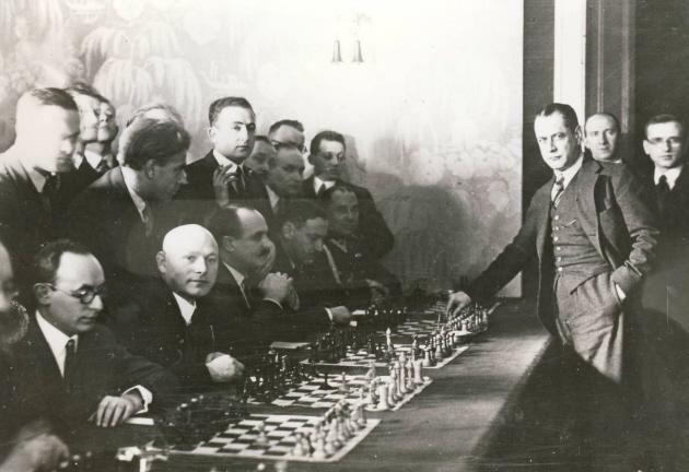 Capablanca seated far left, Marshall on the far right; unclear which  tournament, but at a guess somewhere between 1915 to 1920. #…